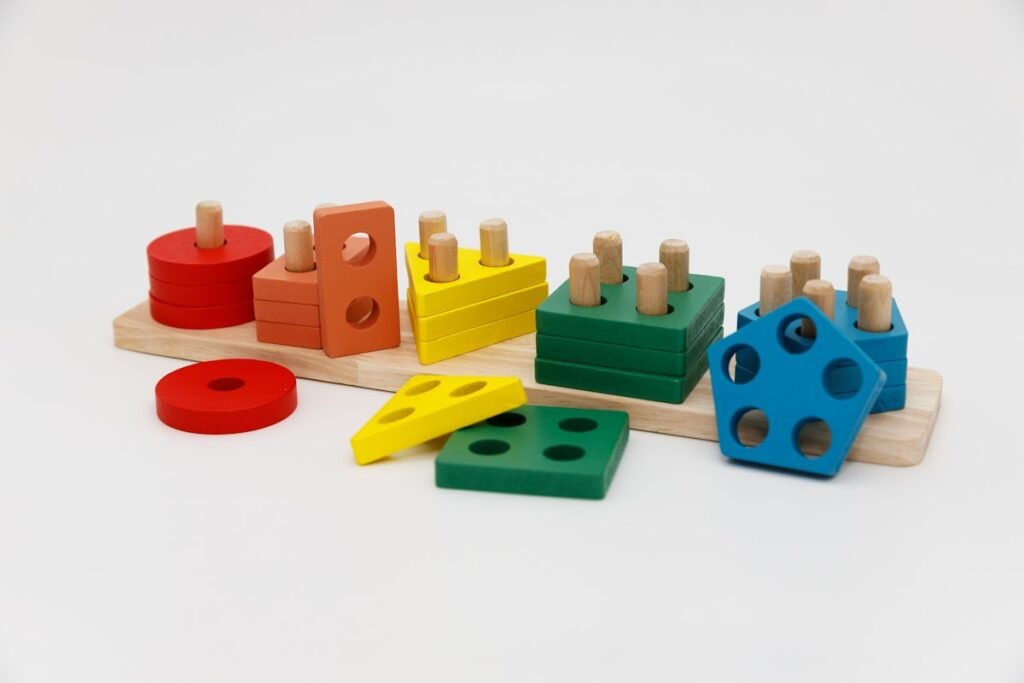 Wooden shape sorter toy with colorful blocks
